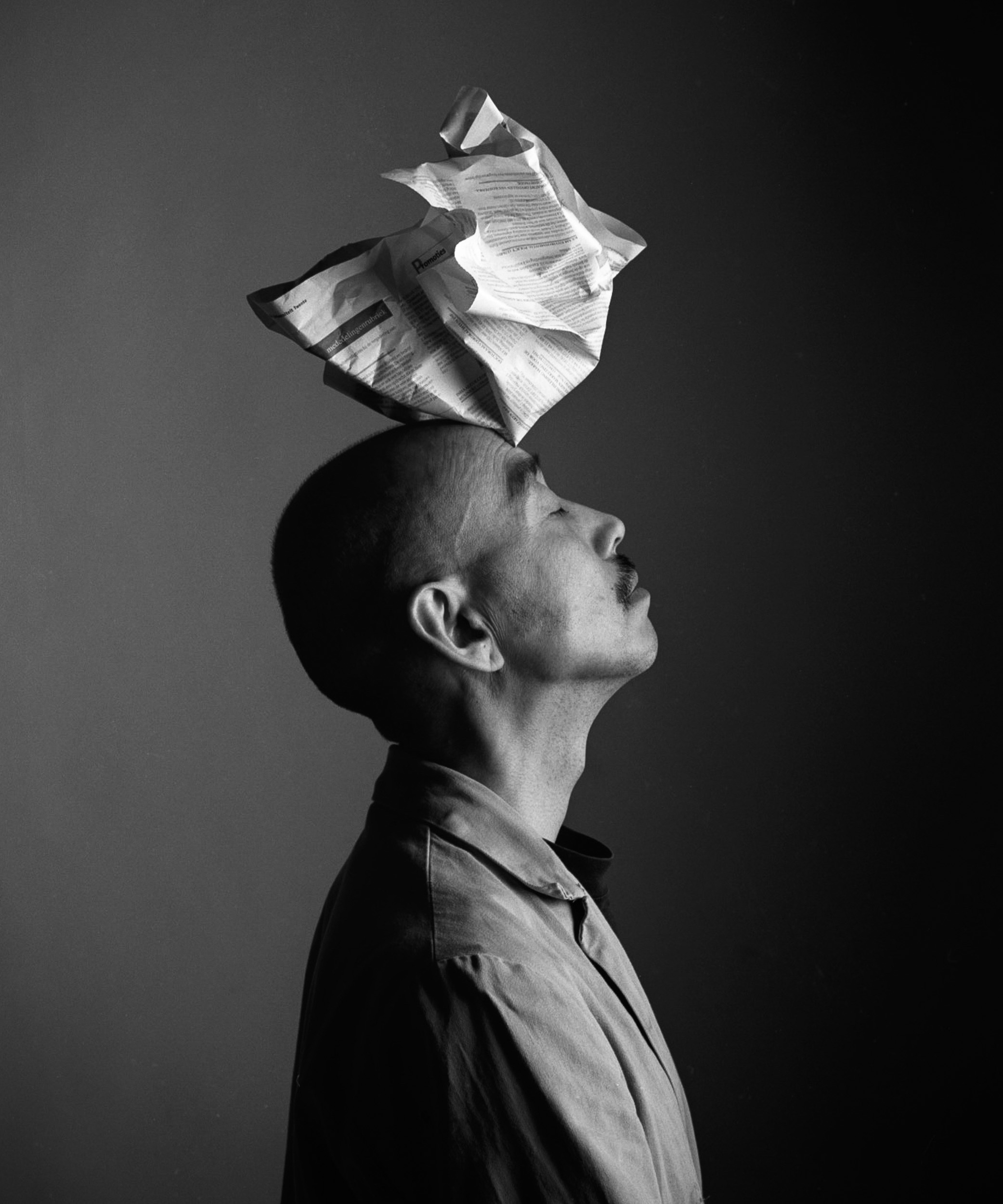 Reading news paper-3